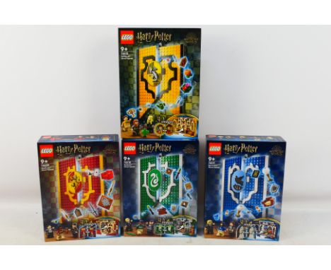 Lego - Four boxed factory sealed Lego Harry Potter 'House Banner' sets. Lot includes #76409 Grffindor House Banner; #76410 Sl