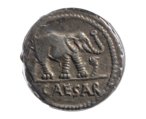 Julius Caesar Silver Denarius49-44 BCElephant advancing right, trampling horned serpent; CAESAR in exergue / Pontifical imple