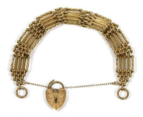 A 9 carat gold gate link bracelet with heart shaped padlock clasp 