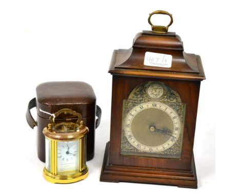 A Matthew Norman oval carriage timepiece, in travelling case; with an electric clock and a school's bell mechanism, cased (3)