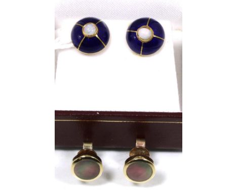 A pair of blue enamel and opal earrings, a round cabochon opal within a blue guilloche enamel and gilt dome, measure 12mm in 