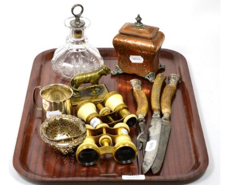 A three-piece horn and silver handled carving set; two pairs of opera glasses; a very worn plated tea caddy; a silver miniatu