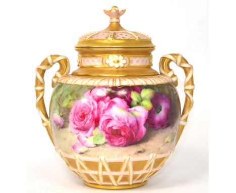 A Royal Worcester twin-handled pot pourri with cover and lid, painted floral decoration by F.H.Chivers, signed, gilt embellis