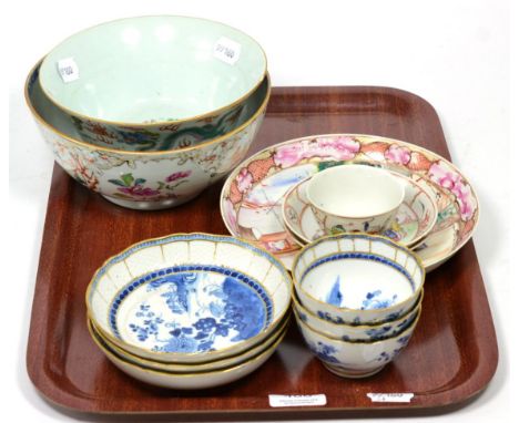 A group of Chinese porcelain to include a dragon and phoenix bowl; tea bowl and saucers ; together with a set of three blue a