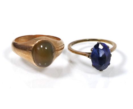 A cabochon set signet ring, finger size M1/2 and a synthetic sapphire ring, finger size K1/2, 6.0g gross 