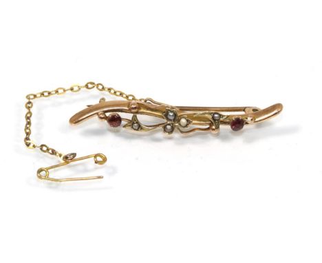 An Edwardian 9 carat gold seed pearl and amethyst bar brooch 