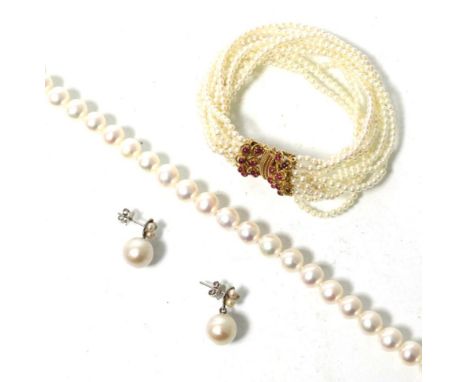 An Akoya cultured pearl necklace with a Chinese character clasp, length 43cm, a pair of cultured pearl earrings and a culture