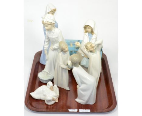 A quantity of Lladro and Nao figures 