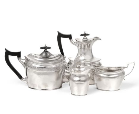 A silver four piece tea service, Mappin & Webb, Sheffield 1921, navette shape with a band of engraved decoration and ropework