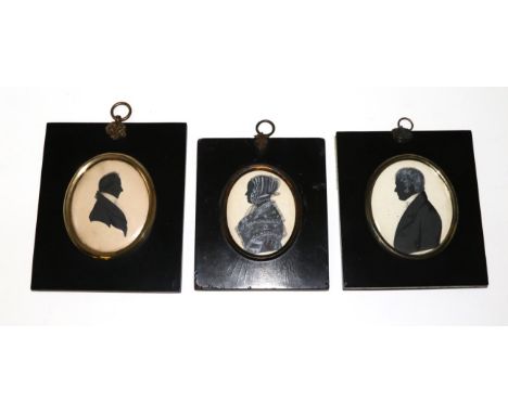 Three 19th century portrait miniature silhouettes in ebonised frames, inscribed with sitters verso