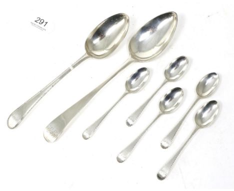 A set of six George III silver bottom marked feather edge teaspoons, William Fearn, London circa 1775; a bead edge table spoo