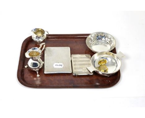 A group of assorted silver items, comprising: a quaich, Birmingham 1904; an engine turned cigarette case; a card case Chester