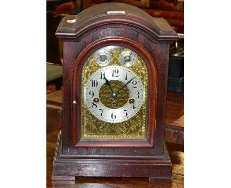 An early 20th century, mahogany bracket clock, three train chiming Junghams movement, Arabic dial with two subsidiary dials