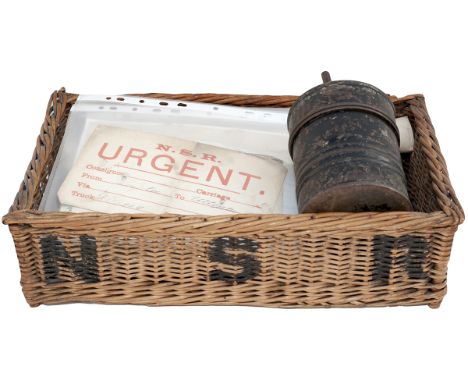 North Staffordshire Railway lot to include: a string tin stamped on the side NSRY, a wicker basket with NSR on the side, vari