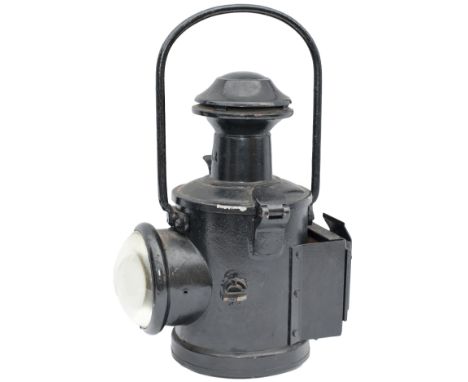 BR(E) locomotive headlamp complete with red flip over shade and original reservoir and burner. Has been painted black.