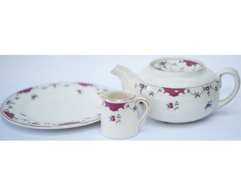A selection of LMS Royal Scot Rose pattern china items to include: a teapot base marked GRINDLEY ENGLAND LMS DINING CARS JULY