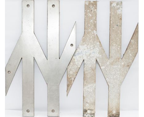 A pair of British Rail cast aluminium DOUBLE ARROW cabside logos. Both are 27.5in long and probably ex class 33, one with som