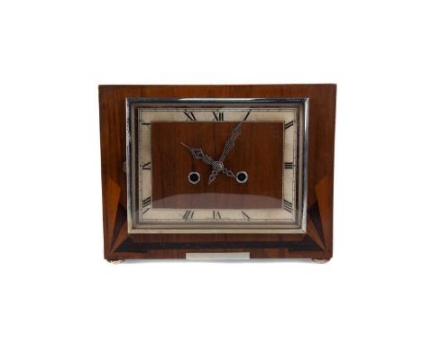 ART DECO MAHOGANY MANTEL CLOCK,with two train eight day movement, the silvered dial with Roman numerals, the case with parque