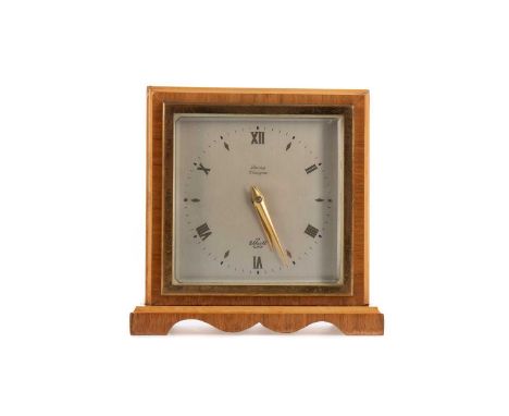 ART DECO MANTEL CLOCK BY ELLIOTT,retailed by Laing of Glasgow, the circular dial set with Roman and lozenge numerals, in waln