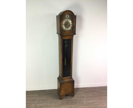 WHITTINGTON WESTMINSTER OAK GRANDMOTHER CLOCK,early 20th century, the silvered chapter ring set with Roman and Arabic numeral