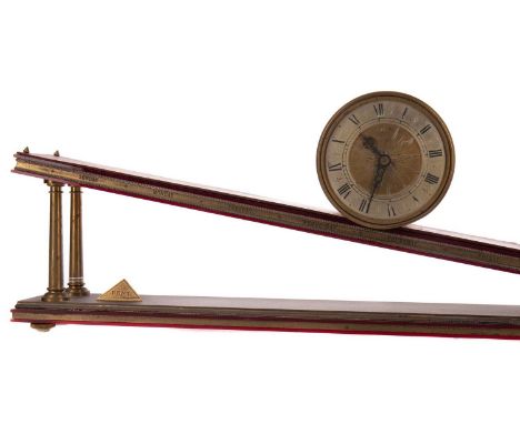 INCLINED PLANE CLOCK BY DENT OF LONDON,for John Chalmers Mitchell, 1973, the brass drum timepiece with silvered Roman numeral