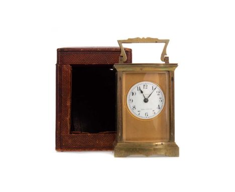 LATE 19TH/EARLY 20TH CENTURY FRENCH BRASS CASED CARRIAGE CLOCK,by R. Scott of Paris, of serpentine outline, the circular sign