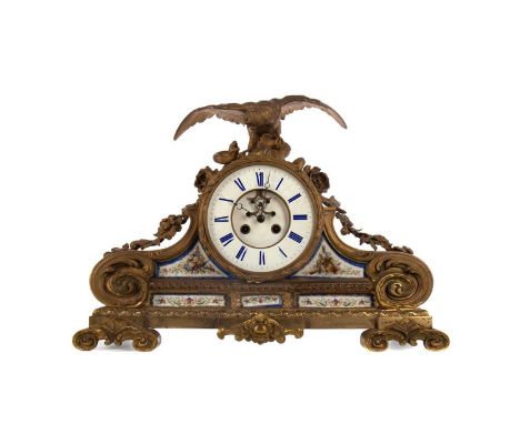 LATE 19TH CENTURY FRENCH EIGHT DAY MANTEL CLOCK,by Rollin of Paris, gilt metal cased, with eagle and snake surmount above ena