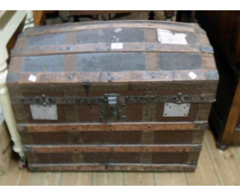 A 30" Victorian bentwood and metal bound dome top travelling trunk with remains of canvas weather coating and repaired latch 