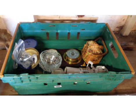 A crate containing assorted items including scales, clock/barometer, teapot, etc.