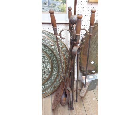 A wrought iron companion set, ladle and chestnut roaster