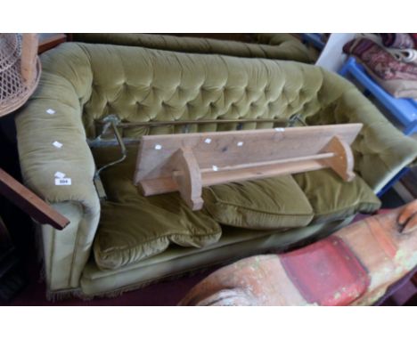 A 6' 20th Century three seater Chesterfield settee upholstered in button back green velour 