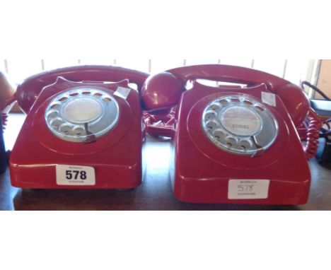 Two vintage red rotary dial telephones - with modern wiring