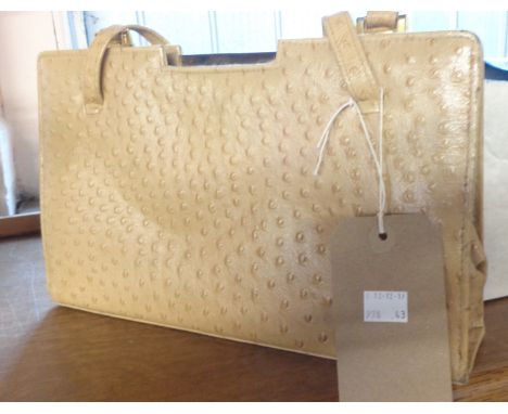 A tan ostrich leather handbag