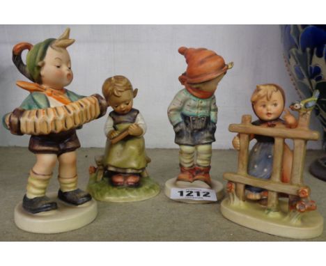 Four Hummel figures