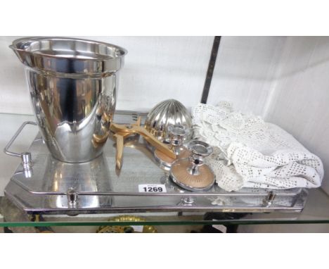 A 1930`s style chrome galleried tray - sold with a pair of ice tongs, candlestick, ice bucket, etc.