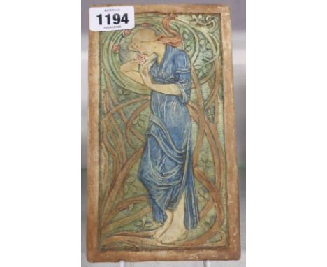An Art Nouveau Compton Potter's Art Guild painted pottery plaque depicting a woman smelling a rose
