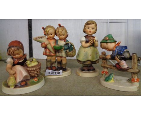 Four Hummel figures