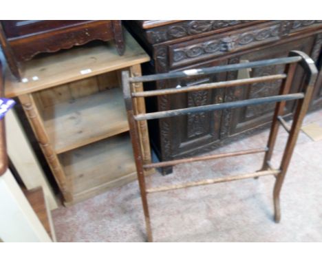 A 24" waxed pine two shelf open bookcase with flanking half spindle decoration - sold with an old stained wood double towel r