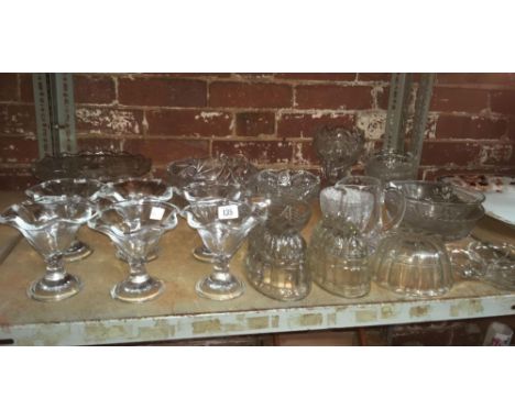 SHELF WITH MIXTURE OF GLASS BOWLS, JELLY MOULDS, FRUIT DISHES, VASES