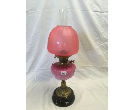VICTORIAN OIL LAMP WITH CLEAR FUNNEL, CRANBERRY RESERVOIR &amp; SHADE WITH DOUBLE BURNER ON BRASS PEDESTAL &amp; BLACK CHINA 