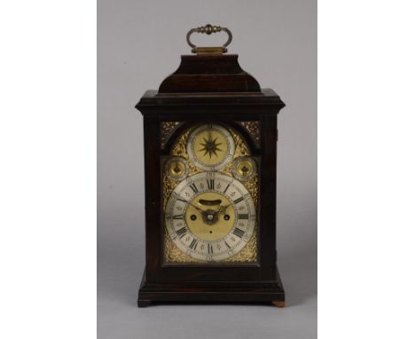 A GEORGE II EBONY CASED BRACKET OR TABLE CLOCK, signed on the backplate 'Windmills London', the caddy topped case with gilt b