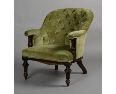 A VICTORIAN MAHOGANY BUTTON BACK UPHOLSTERED ARMCHAIR, having turned and fluted uprights and legs