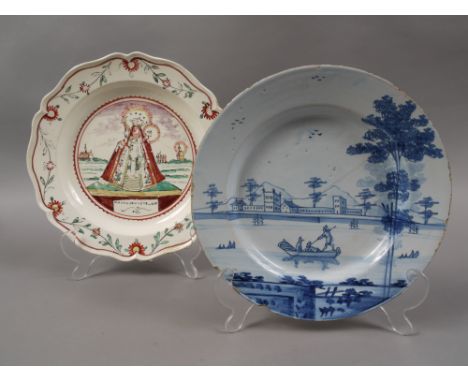 AN ENGLISH CREAMWARE PLATE, c.1780, with Dutch decoration titled 'Maria Van Kevelaar', 25cm diameter, together with a mid 18t