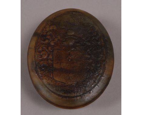 AN OVAL HORN SNUFF BOX, by John Obrisset, c.1712, carved with Drake's Arms and Crest, 10.5cm