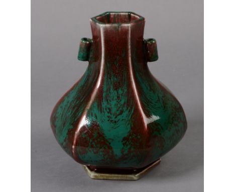 A CHINESE FLAMBE 'ARROW' VASE, of hexagonal section, with double loop handles, decorated in iron-red and copper green, impres