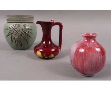 A LINTHORPE SMALL POTTERY EWER, with angular handle, crimson to yellow glaze, impressed mark, 8.5cm high, a Pilkingtons small