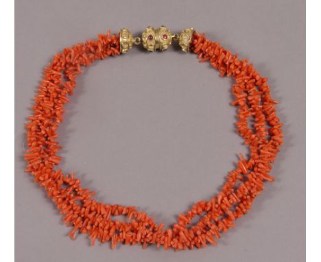 A MID 20TH CENTURY STICK CORAL THREE ROW CHOKER NECKLACE, fastened with a split bombé snap, collet set with small circular fa