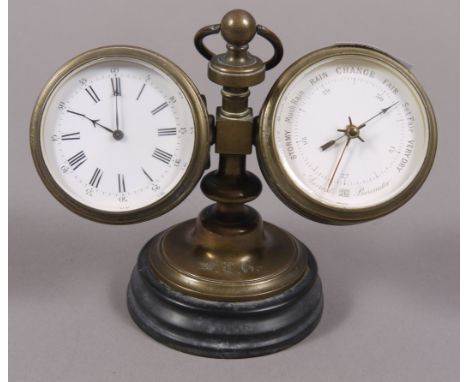 A LATE 19TH CENTURY BRASS CASED COMBINED DESK TIMEPIECE AND BAROMETER AND THERMOMETER, with turned brass central pedestal and