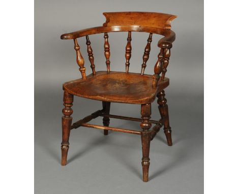 A 19TH CENTURY ASH AND ELM SMOKER'S BOW, stamped C R to the seat, having a raised back above slender spindles, on turned legs