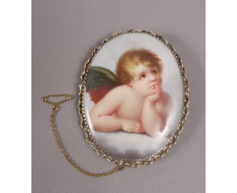 A LATE 19TH CENTURY CERAMIC BROOCH, in silver gilt, oval, painted with a cherub portrait after Raphael, collet set within a r